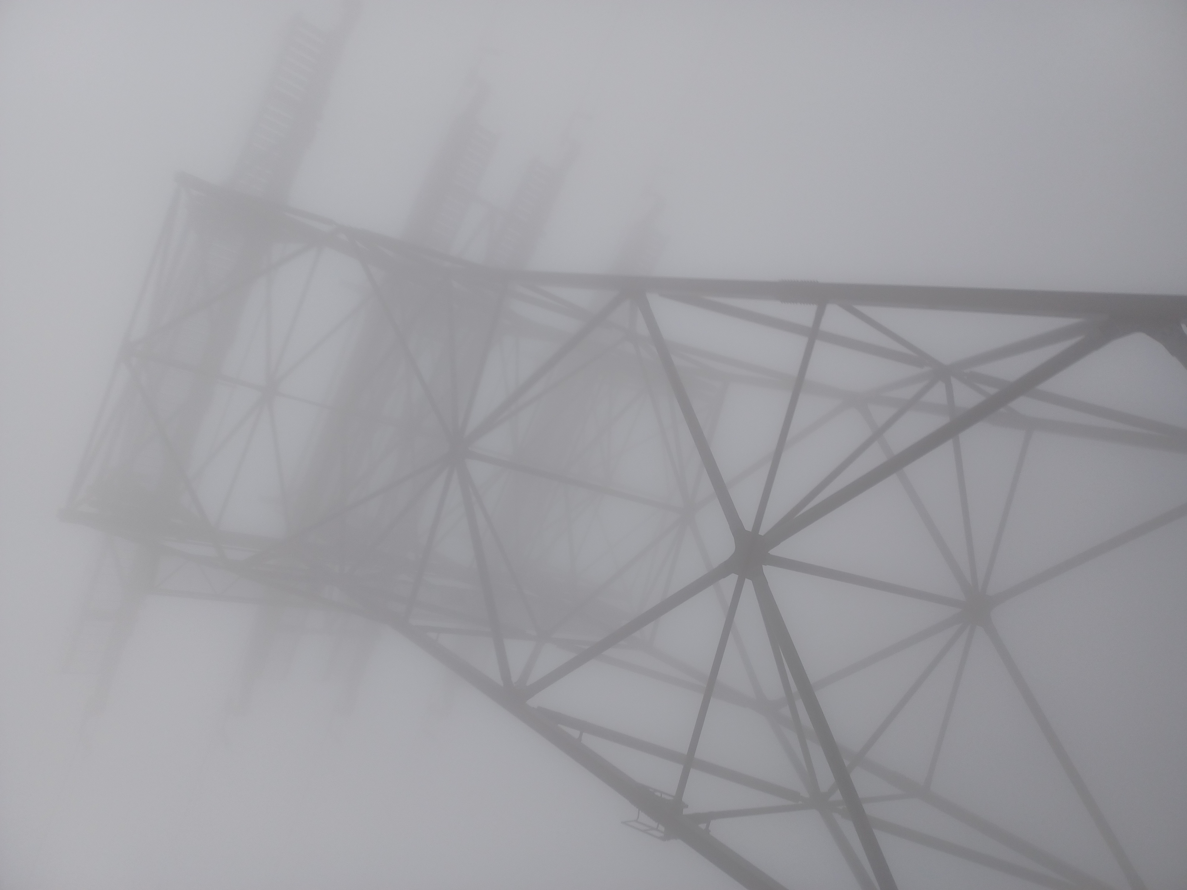 Cable-car tower in the mist