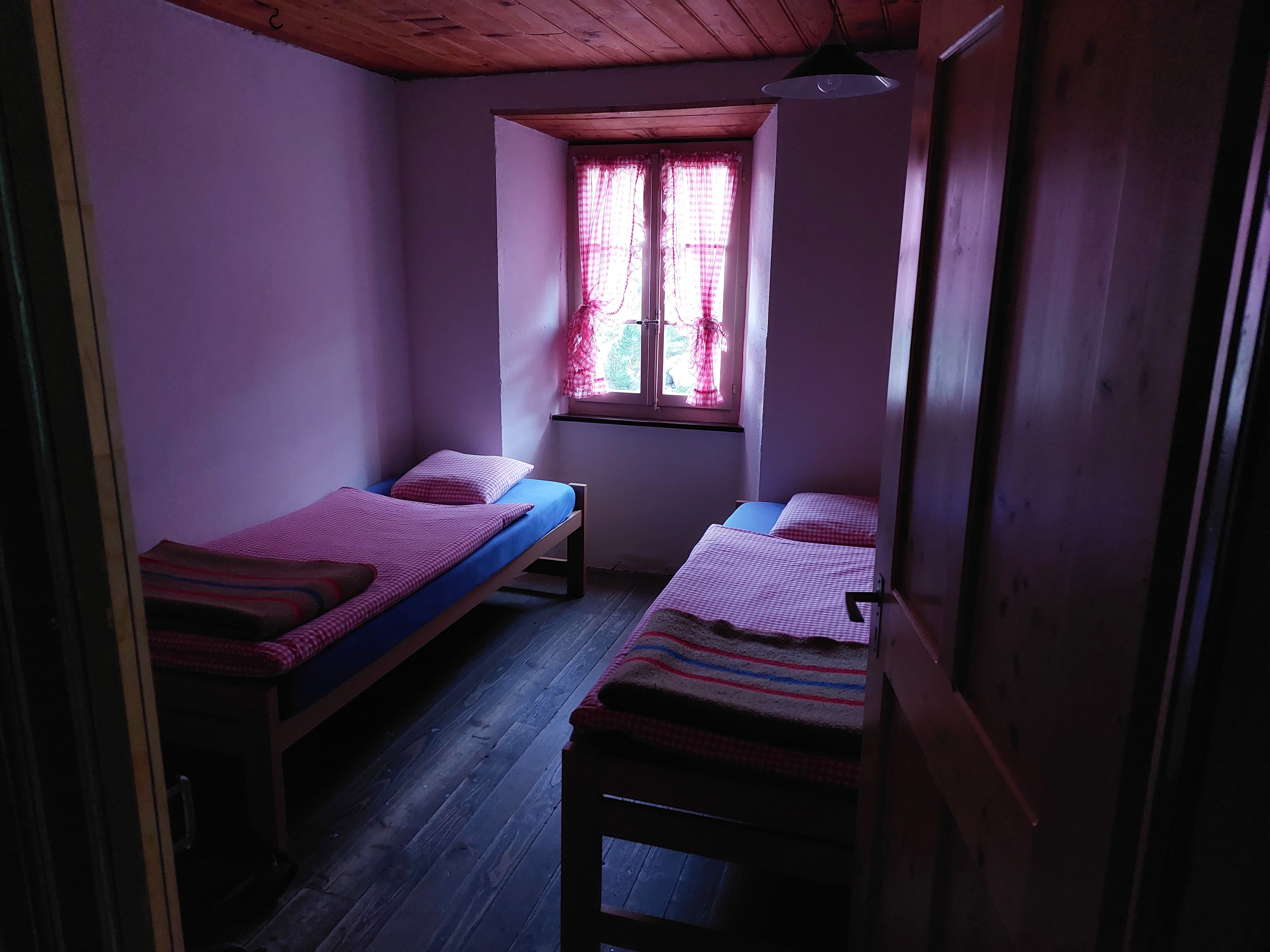 Room with two single beds