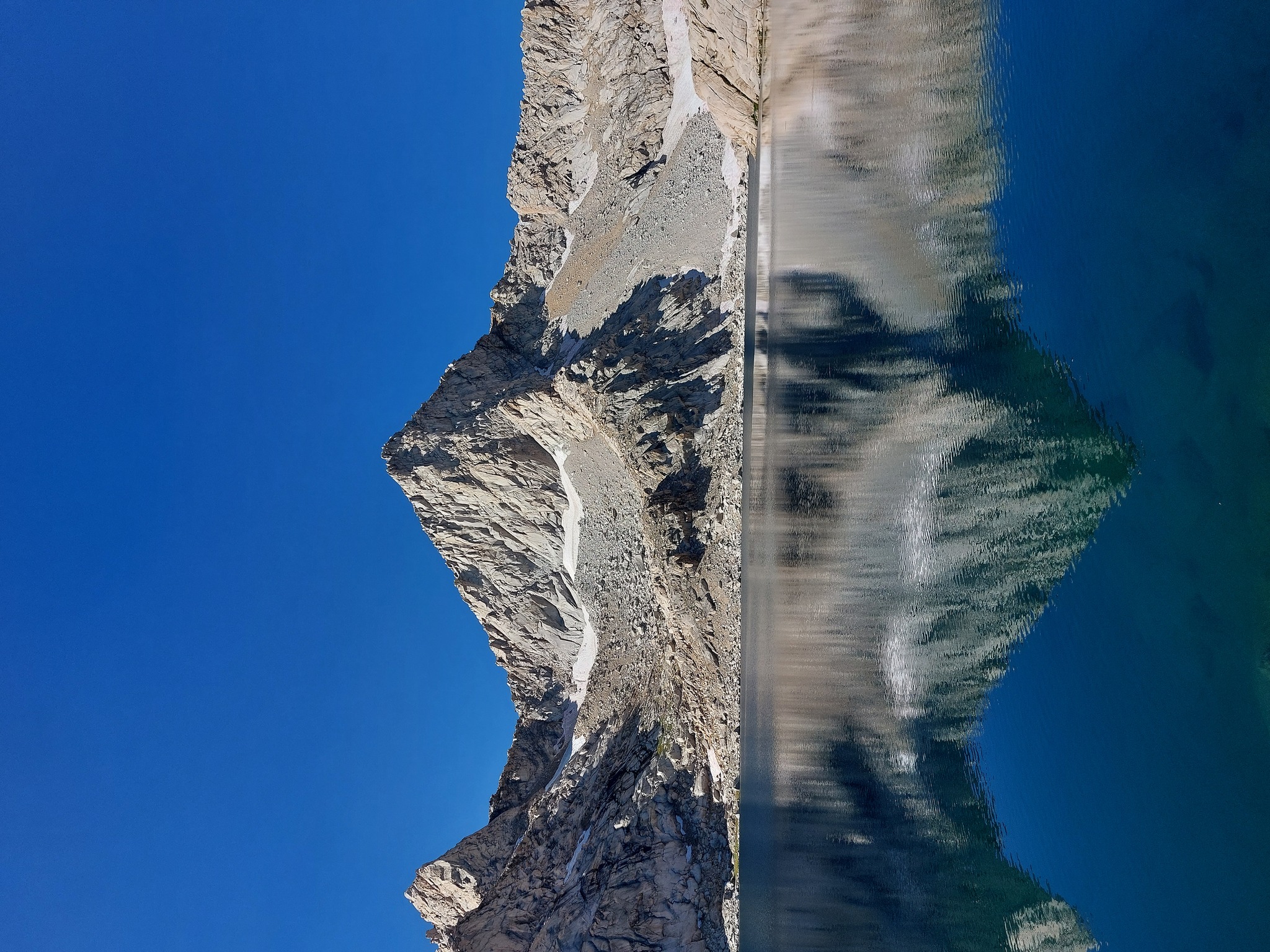 Sawtooth Peak reflected on Columbine Lake