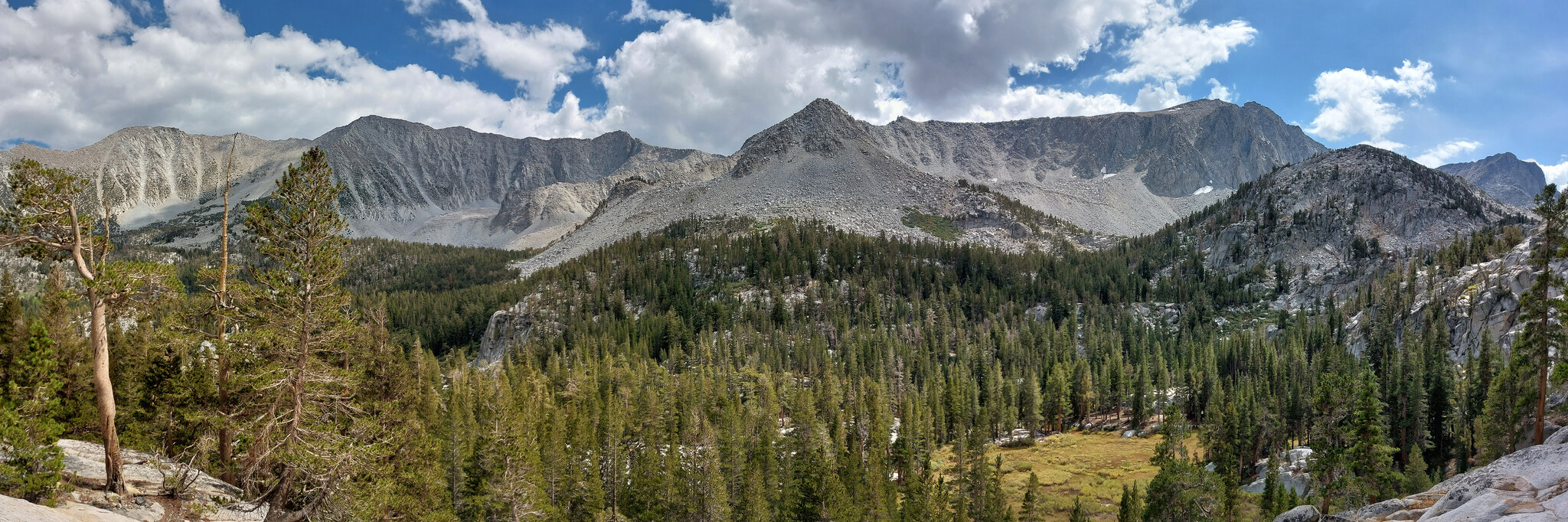 Mountain range with little meadow below