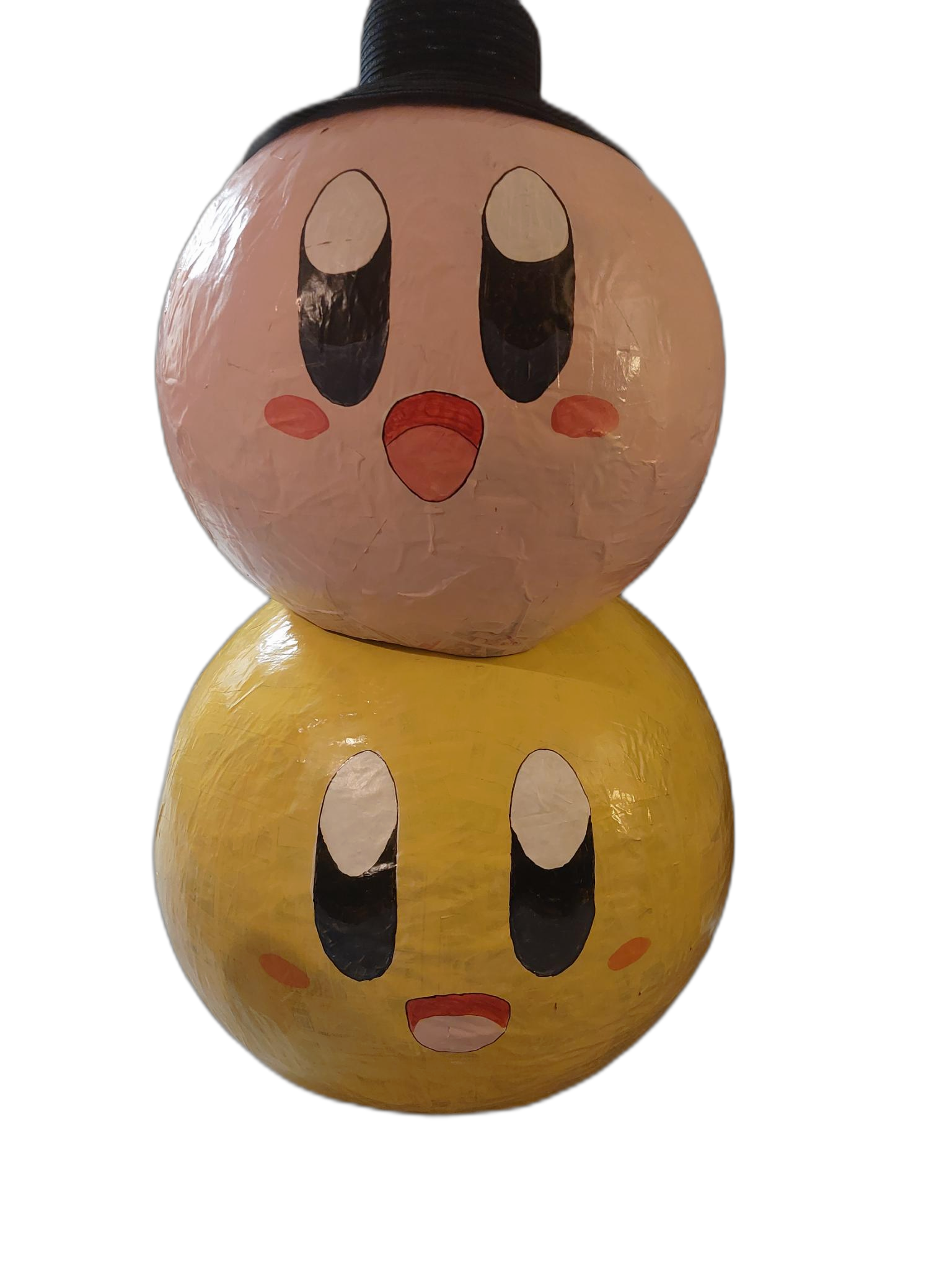 Pink Kirby stacked on Yellow Kirby